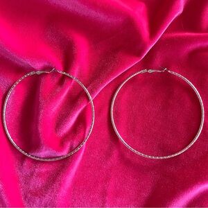 Large silver-tone etched hoops